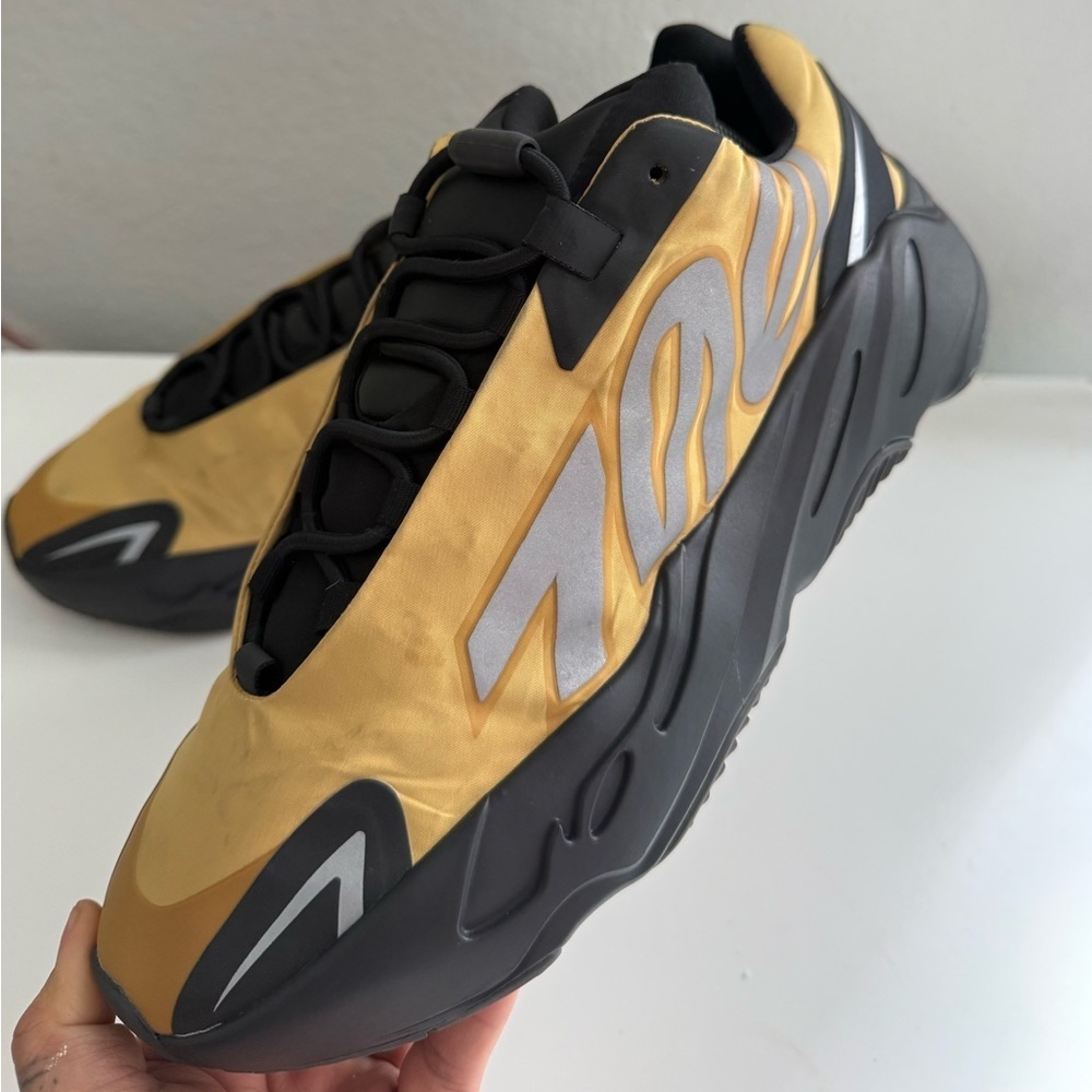 Adidas Yeezy Boost 700 MNVN
Yeezy Wave Runner Sneakers in Gold and Black - Picture 1 of 10